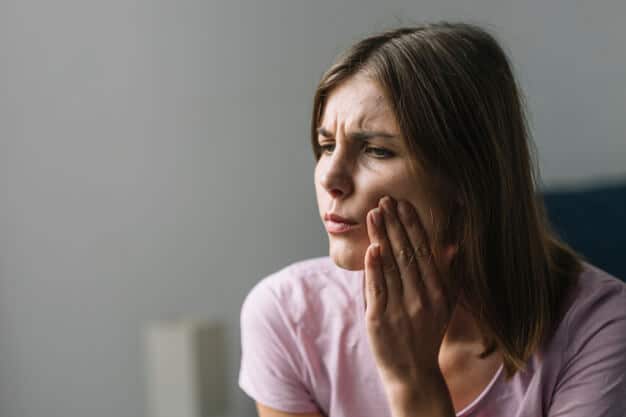 portrait-young-woman-suffering-from-neck-pain